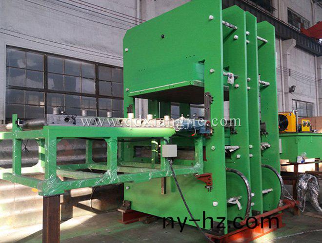 框式平闆硫(liu)化(hua)機